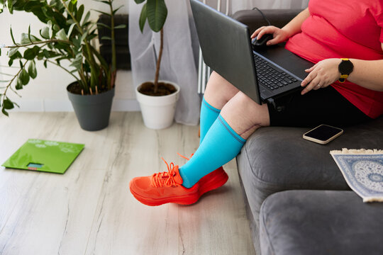 Person working on a laptop at home