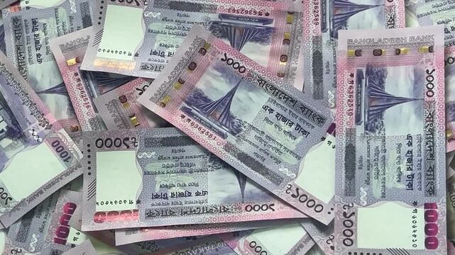 Bangladeshi Taka Banknotes Background Showing BDT Currency and Financial Economy. Bangladesh currency