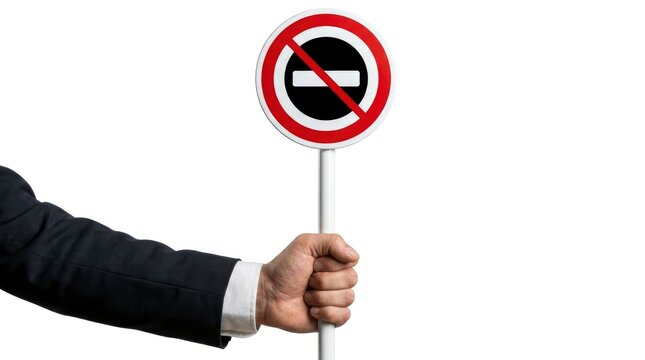 Business person holding a no entry prohibition sign isolated on white