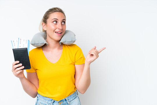 Woman with Inflatable Travel Pillow intending to realizes the solution while lifting a finger up