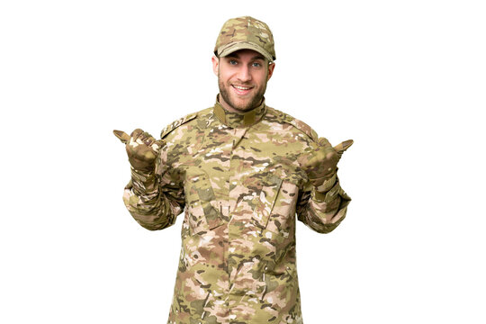 Military man over isolated chroma key background with thumbs up gesture and smiling