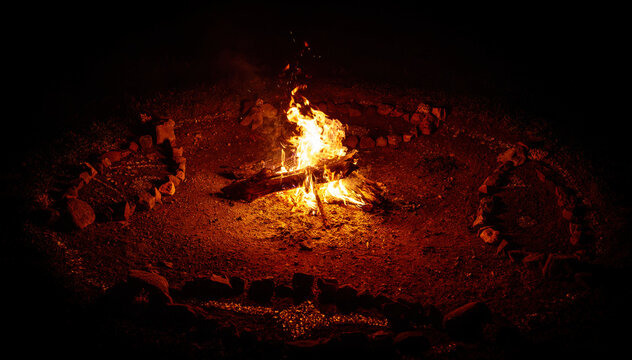 Sacred Fire Pit Decorated with Ceremonial Mandala Ornaments and Stone Circle.