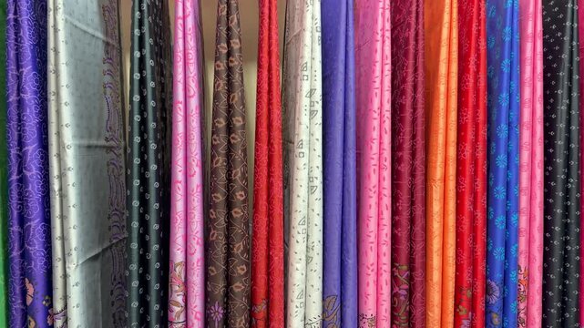 Colorful Rajshahi Silk Sarees Displayed at Traditional Textile Store in Bangladesh. Rajshahi silk