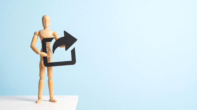 Social media export and content share concept with wooden mannequin holding forward arrow symbol with copy space for digital marketing banner