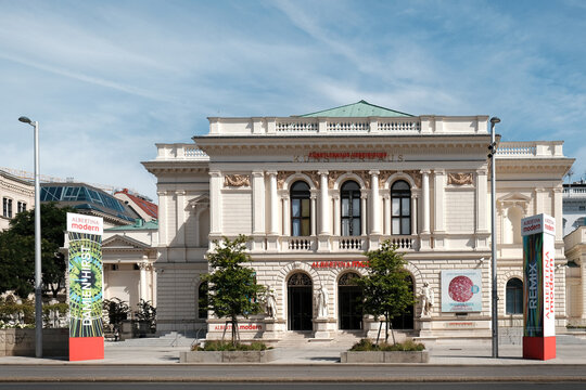 Vienna, Austria - August 24, 2025: Historic Kunstlerhaus building facade hosting Albertina Modern museum with promotional banners.