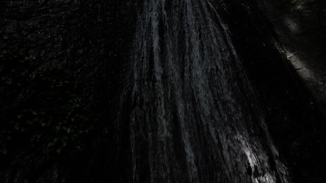Sunlit Kanjou Falls in Mima, Tokushima, Japan &ndash; Aerial Drone View of a Waterfall Illuminated by Sunlight Filtering Through the Forest

