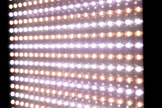 Extreme close-up of a bright LED spotlight panel for photo and video shoots. Technology, illumination, electricity, Light equipment for movie production, photo shooting.