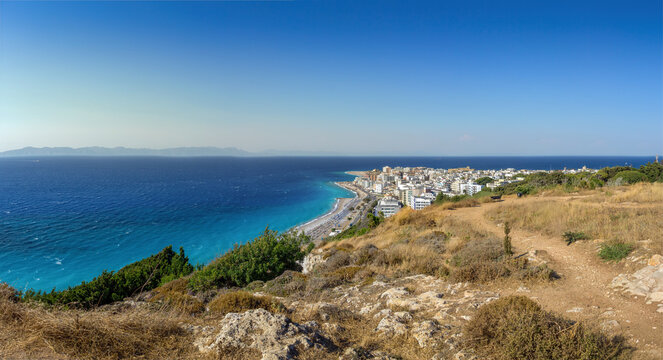 Panoramic coastal view of Rhodes city and turquoise sea from Monte Smith hill