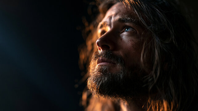 Bearded Man Looking Up Towards Light with Hope and Faith