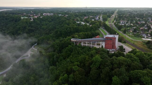 Aerial View of Sigulda Bobsleigh and Luge Track Surrounded by Forest and Morning Mist, Latvia