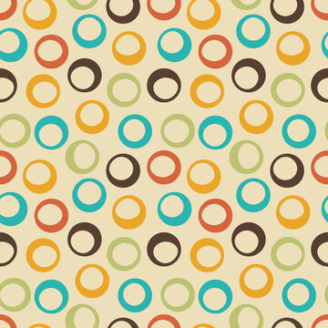 Colorful geometric seamless pattern with retro circle rings. Abstract modern background for wallpaper, textile and wrapping paper