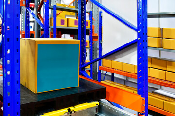 Industrial cardboard box package stored on automated racking system in smart logistics warehouse © I Viewfinder