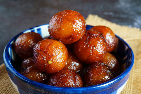 Taaler Pantua Traditional Bengali Janmashtami Bhog Sweet Made with Palmyra Palm Pulp and Fried Cottage Cheese Dumplings in Sugar Syrup
