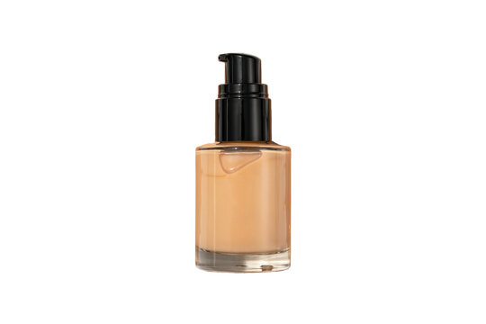 Glass bottle of liquid foundation makeup with a black pump dispenser and beige cosmetic cream texture isolated on a transparent background