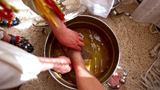 Traditional Moroccan foot washing and spa treatment in warm water