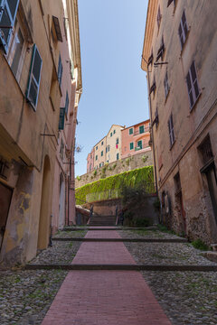 Pedestrian street in the old town of Imperia, seaside city on the Italian Riviera