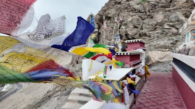 buddhist colourful tibtan praying flags waving in the wind in the Himalaya