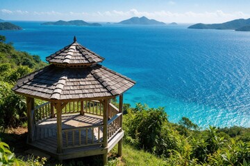Naklejka premium Wooden gazebo offers scenic ocean panorama. Tropical islands dot azure sea under bright sunny sky. Lush green foliage surrounds tranquil viewpoint on warm day.