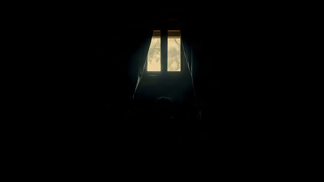 Dark wooden confessional booth with a figure kneeling inside, heavy velvet curtain and soft light.