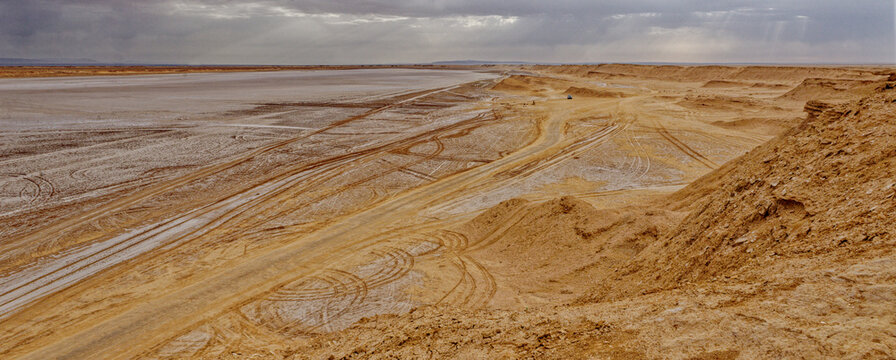 Vast Chott el Djerid Salt Flat with Off-Road Tire Tracks