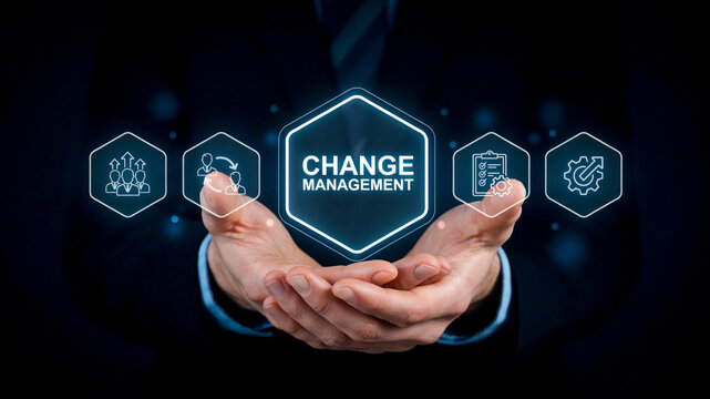 Professional Business Leader Hands Holding Digital Hexagonal Icons Representing Comprehensive Organizational Change Management Strategy