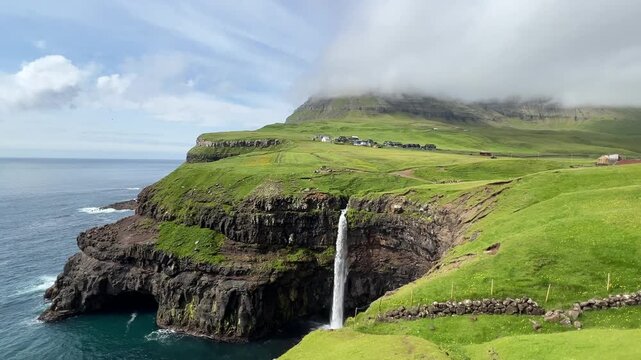 M&uacute;lafossur Waterfall at Faroe Islands in Summer	