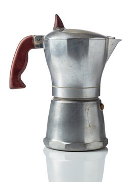 A classic Italian aluminium moka pot isolated on a white background.