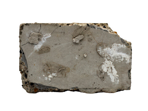 Close-up of raw gray concrete block with rough texture