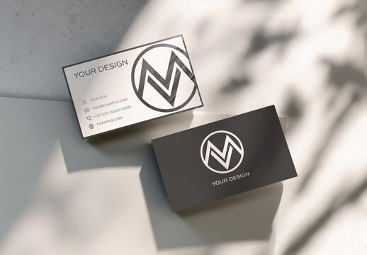 Two Business Cards on White Surface with Soft Shadows Mockup