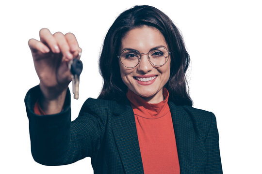 Welcome to new flat great opportunity! Close-up portrait of nice gorgeous attractive cheery wavy-haired lady holding in hands giving key car sales manager agent broker isolated over gray background