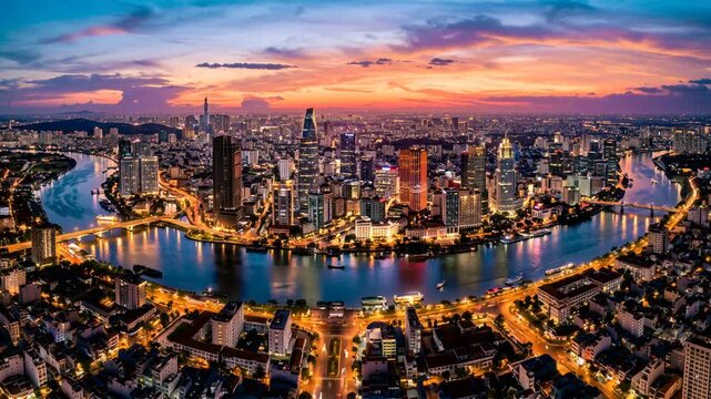 timelapse cinematic aerial view of ho chi minh city downtown business district at sunset, vietnam video