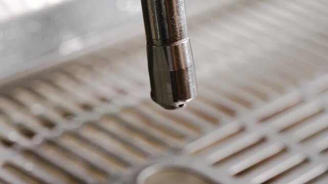 Close Up of Espresso Machine Steam Wand Preparing Hot Milk for Professional Latte and Cappuccino