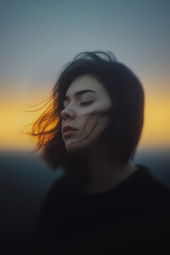 people of ai, windblown blonde woman at sunset near coastal house, photorealistic