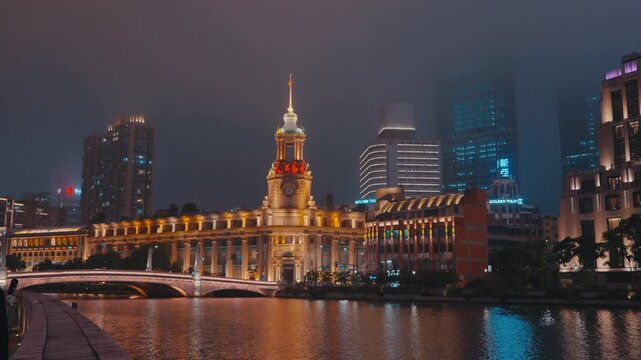 Historic Shanghai Postal Museum in the former General Post Office Building on the banks of Suzhou Creek, featuring its distinctive classical architecture and clock tower Shanghai, China - 30 August 20