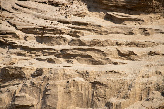 Sand dune close-up showing different layers and textures