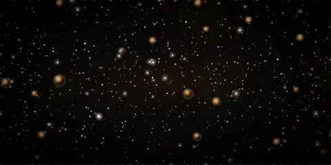 Fototapeta premium Sparkling gold particles drift across a dark, abstract background, creating a sense of wonder and celebration. This versatile graphic resource can be used for various themes.