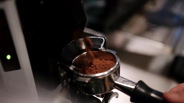 Fresh Ground Coffee Beans Loaded in Portafilter for Espresso Preparation