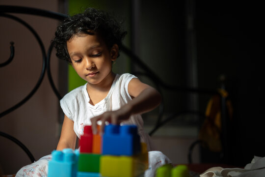 Little girl playing and making fun