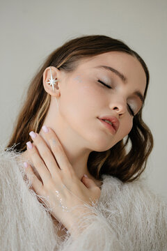 beauty woman with silver star earring