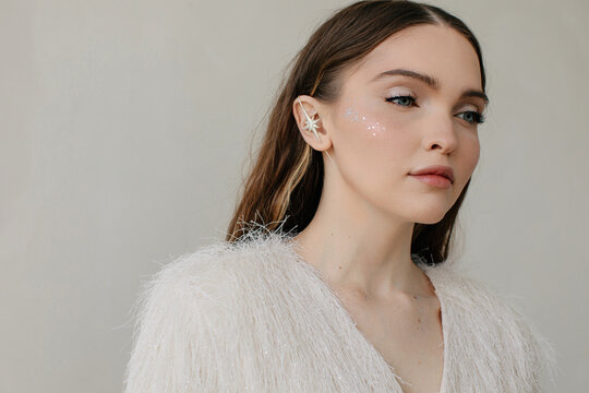 Fashionable woman with unusual earring