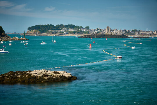 Tidal power - Rance river flows towards St Malo, Brittany, France