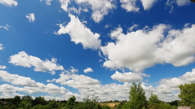 Natural Summer Sky With Large White Clouds Moving Across the Horizon Under Bright Daylight, Weather Timelapse