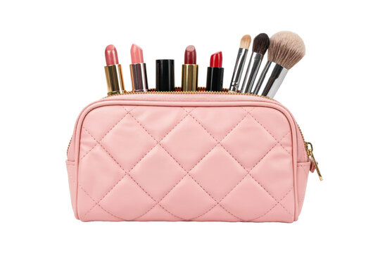 Pink quilted makeup bag filled with assorted lipsticks and cosmetic brushes isolated on a transparent background