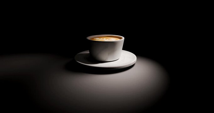 Camera pushing in on cup of latte coffee under dramatic spotlight in dark room representing late night work
