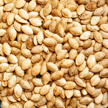 Roasted Pumpkin Seeds seasoned with spices as texture