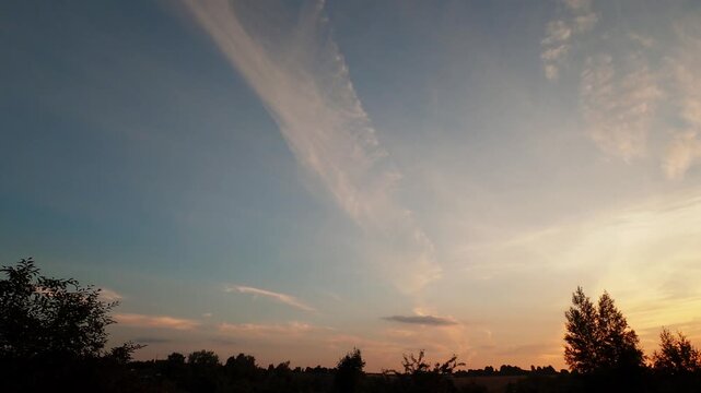 Golden Sunset Behind Moving Clouds Timelapse

