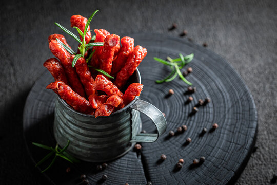 Smoked kabanos seasoned with rosemary and black pepper.