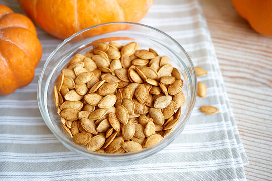 Roasted Pumpkin Seeds seasoned with spices in bowl