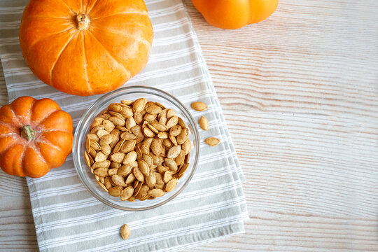 Roasted Pumpkin Seeds seasoned with spices in bowl