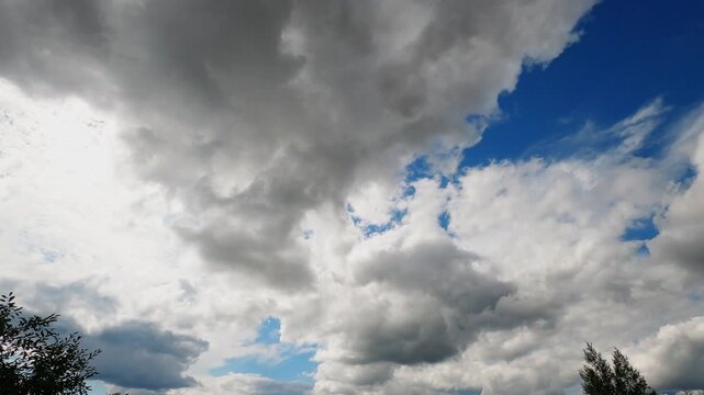 Large Cumulus Clouds Moving Across Summer Sky Timelapse